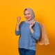 Banner berwarna cerah menampilkan logo Tokopedia dengan tulisan Diskon hingga 70% untuk produk pilihan